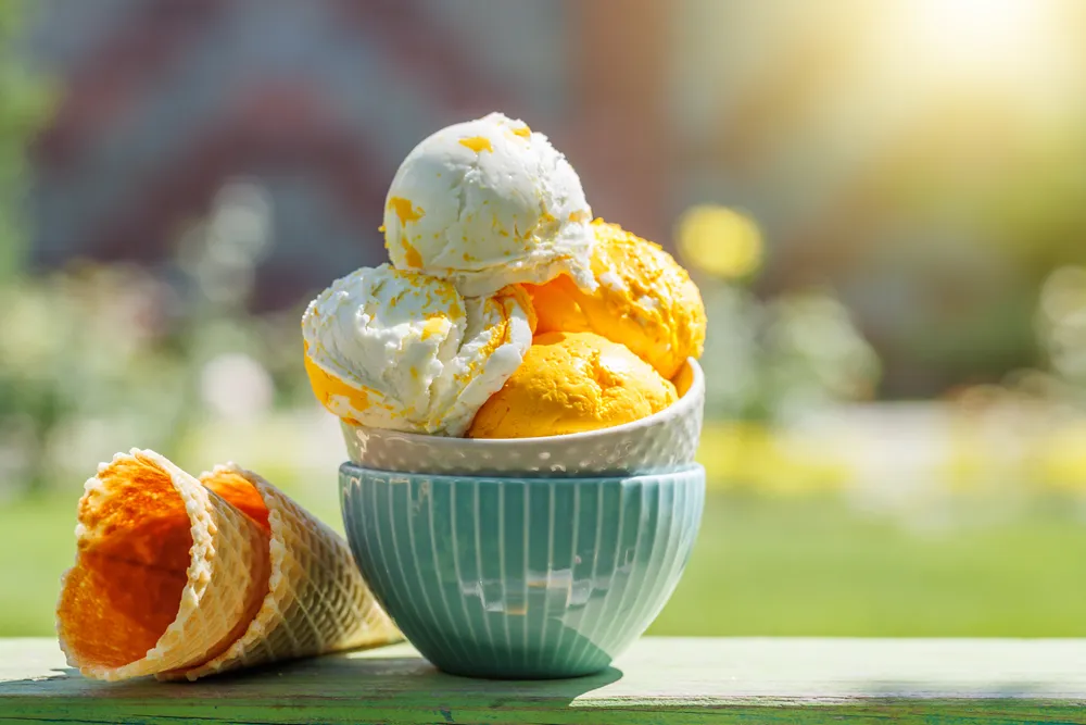 delicious-ice-cream-scoops-in-bowl-outside-2026-01-06-09-28-24-utc
